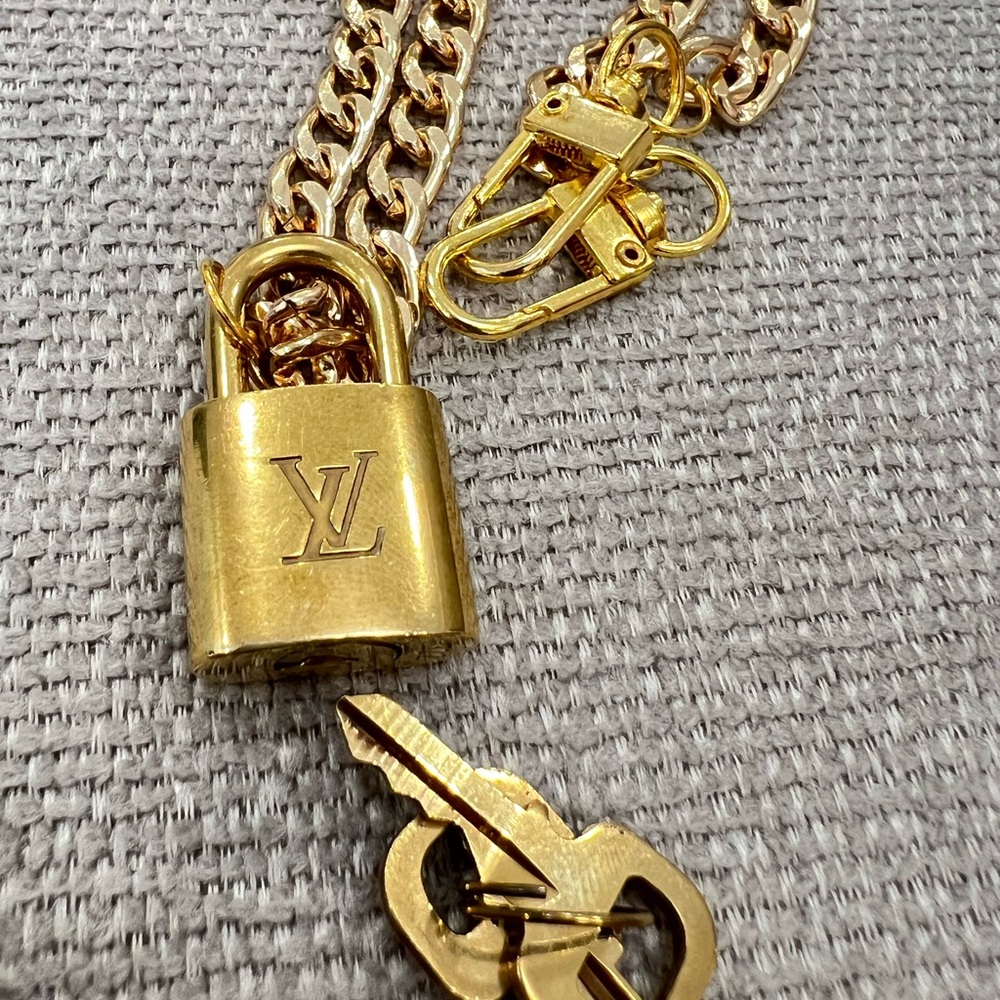Louis Vuitton Gold Padlock w/ double keys